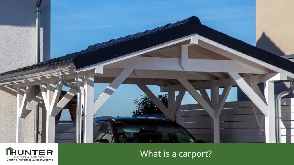 What is a carport? - Photo of a car under a free standing carport.